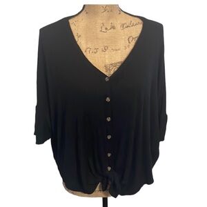 Black ribbed button down short sleeved top. Great Condition!